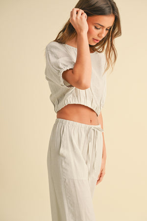 Textured Fabric Top With Button Detail On Back