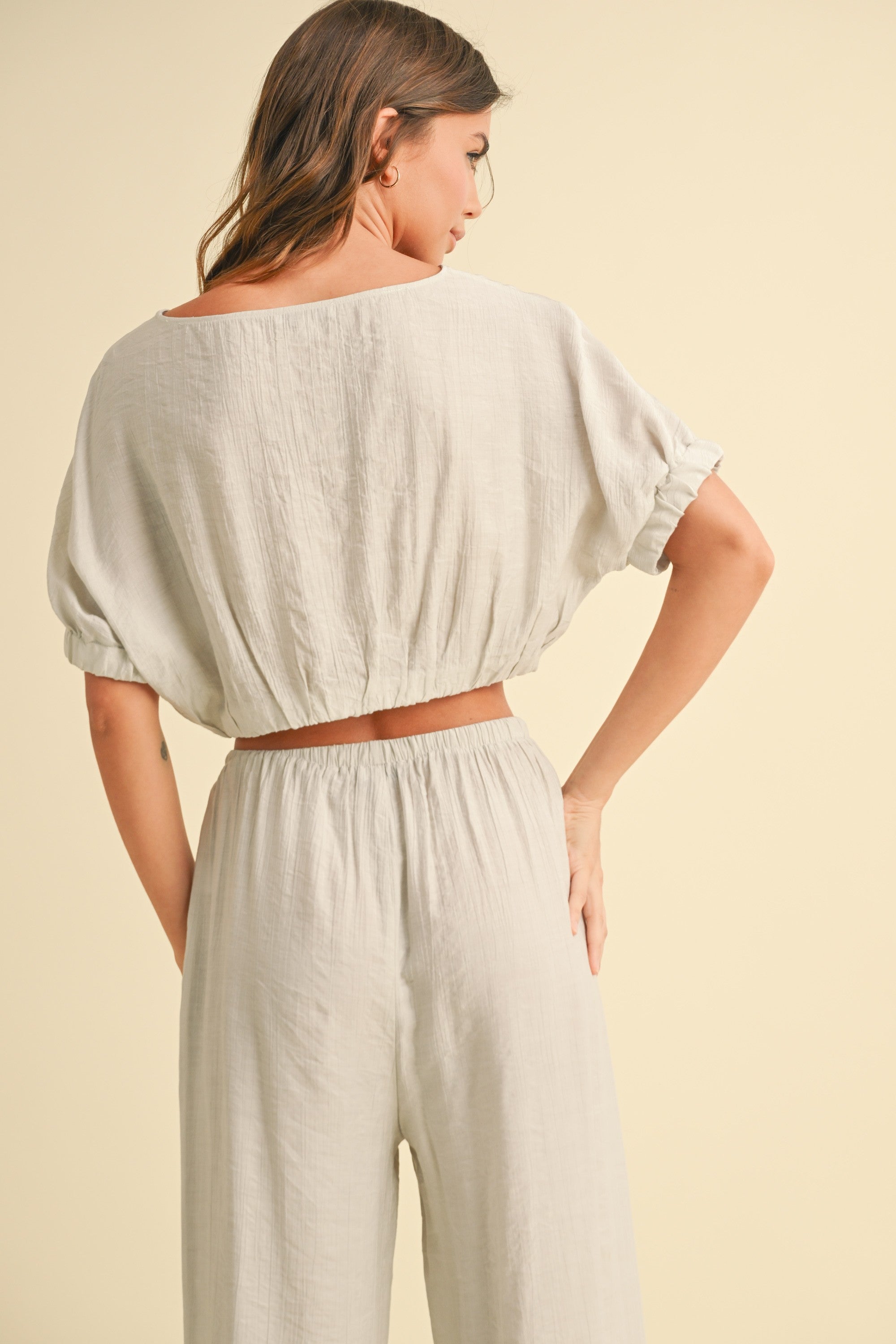 Textured Fabric Top With Button Detail On Back